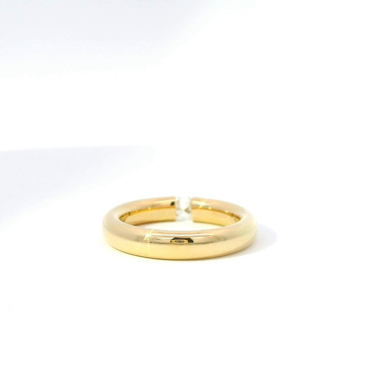 Spannring aus 14 Karat Gelbgold mit Brillant