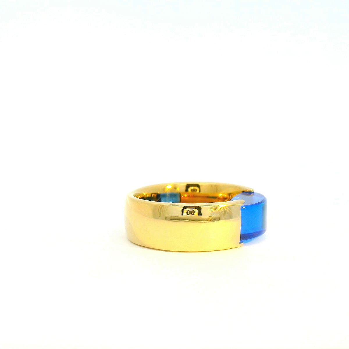 Extravaganter Markenring mit blauem Schmuckstein