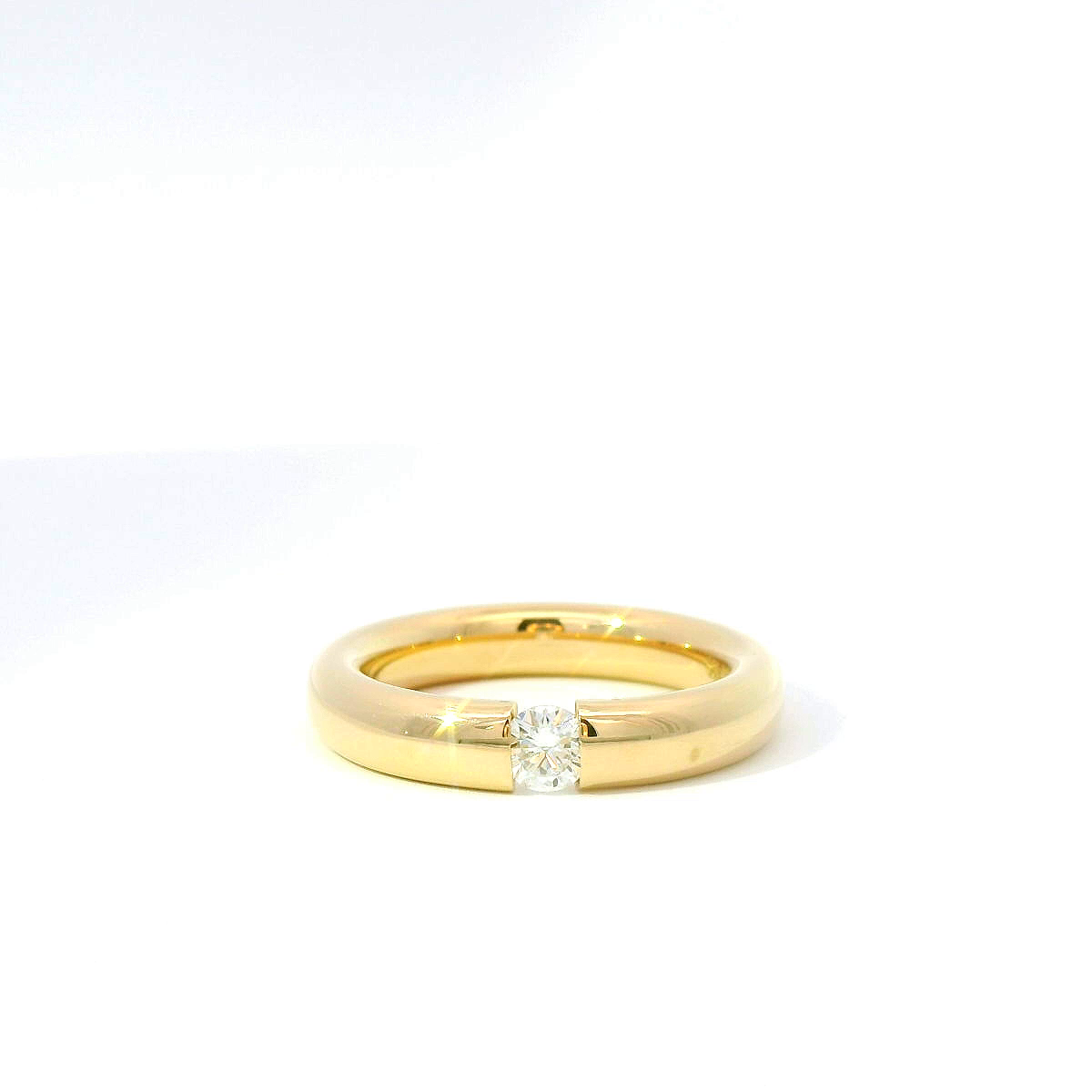Spannring aus 14 Karat Gelbgold mit Brillant