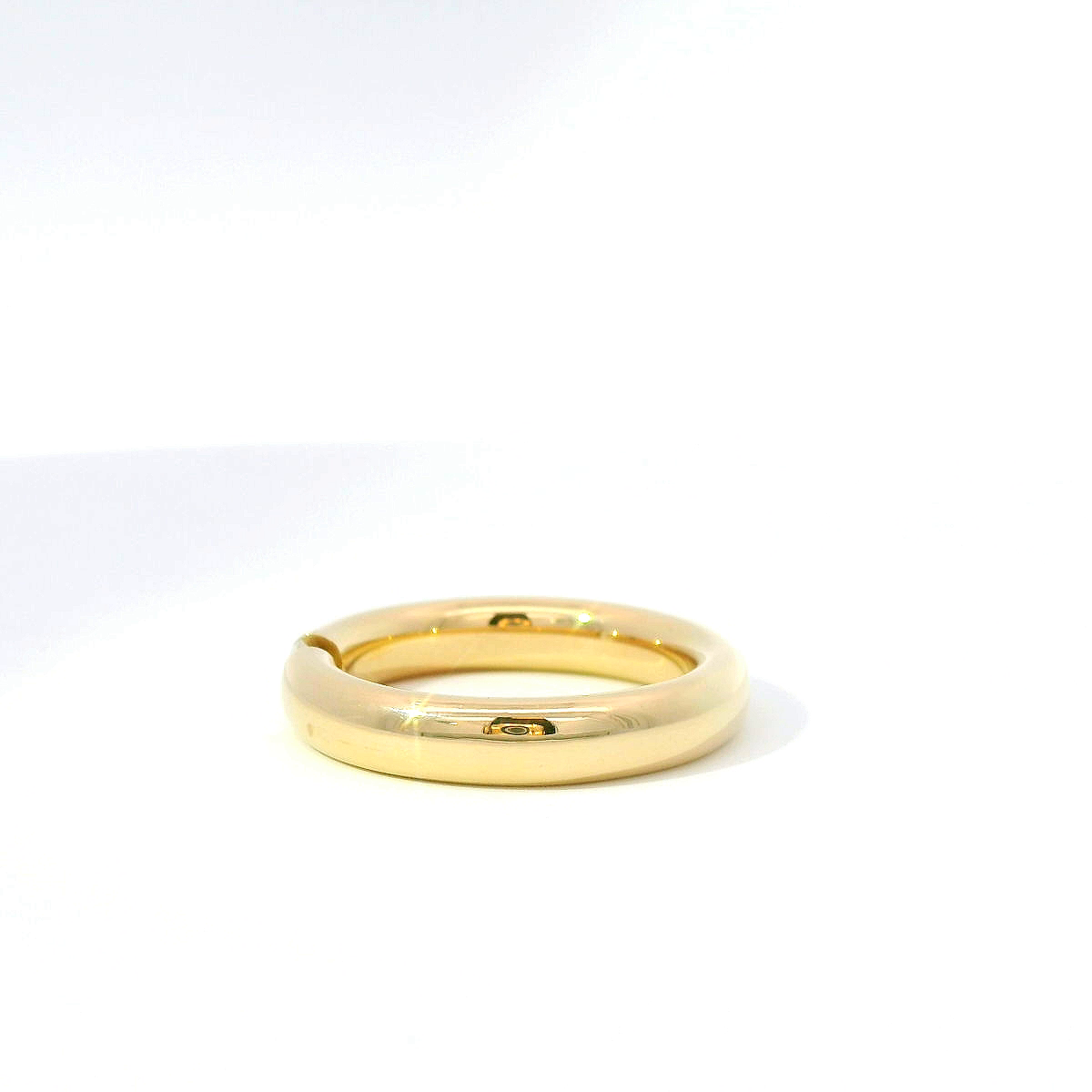 Spannring aus 14 Karat Gelbgold mit Brillant
